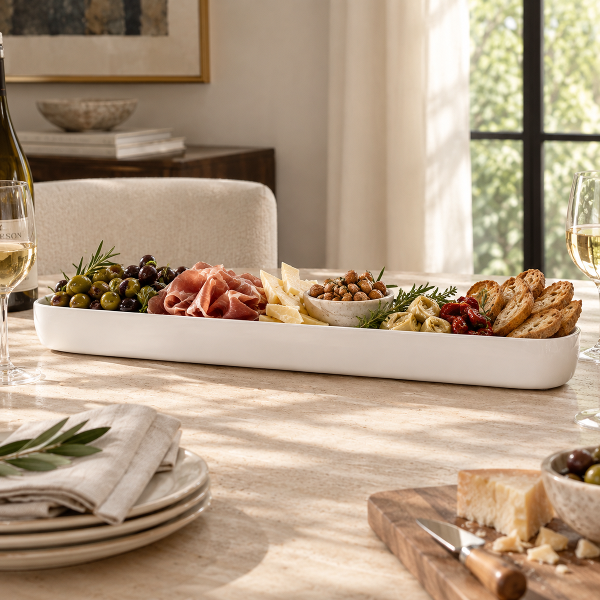 Tina Frey Cuadrado Long Centerpiece Bowl in handcrafted resin on a dining table