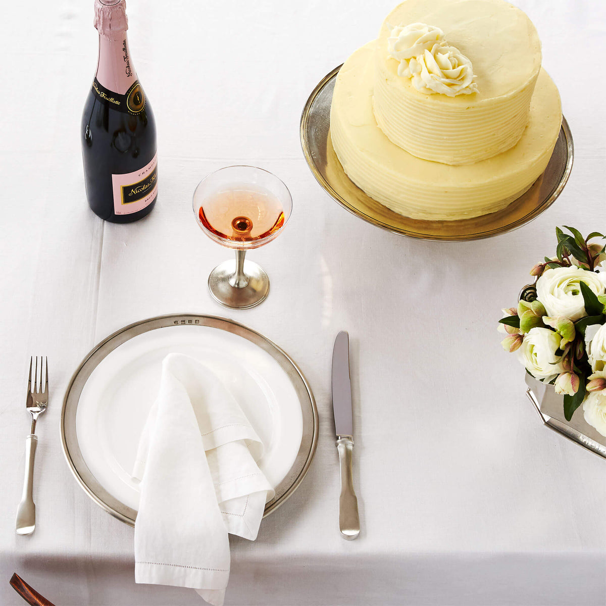 MATCH pewter cake stand on the table